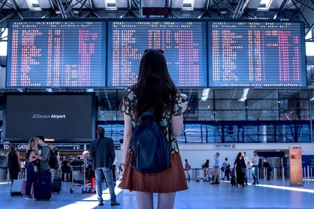 girl standing at airport